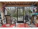 Screened porch with patio furniture and backyard view at 5328 Ridgewell Ct, Tampa, FL 33624