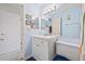 Simple bathroom with white vanity and updated fixtures at 5980 Terrace Park N Dr # 203, St Petersburg, FL 33709