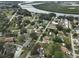 Aerial view showcasing the property's location near the water at 723 Ornelda Sw St, Ruskin, FL 33570