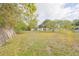 Spacious backyard with a wooden fence at 723 Ornelda Sw St, Ruskin, FL 33570