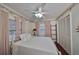 Comfortable bedroom with a double bed and ceiling fan at 723 Ornelda Sw St, Ruskin, FL 33570