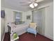 Small bedroom with daybed and light colored walls at 723 Ornelda Sw St, Ruskin, FL 33570
