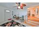 Entryway with floral rug, antique chairs, and staircase at 723 Ornelda Sw St, Ruskin, FL 33570