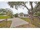 Cute bungalow home with carport and mature landscaping at 723 Ornelda Sw St, Ruskin, FL 33570