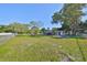 Charming house exterior with carport and spacious yard at 723 Ornelda Sw St, Ruskin, FL 33570