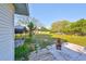 Cozy patio with wooden deck and fire pit for outdoor enjoyment at 723 Ornelda Sw St, Ruskin, FL 33570