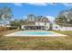 Home with pool and screened porch at 8203 Crenshaw Cir, Tampa, FL 33615