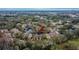 Aerial view of condo community near pond and city view at 8647 Fancy Finch Dr # 203, Tampa, FL 33614
