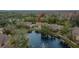 Aerial view of condo community showing building location and pond at 8647 Fancy Finch Dr # 203, Tampa, FL 33614