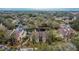 Aerial view of community, featuring a lake and multiple buildings at 8647 Fancy Finch Dr # 203, Tampa, FL 33614