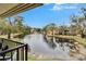 Spacious balcony with lake view and seating at 8647 Fancy Finch Dr # 203, Tampa, FL 33614