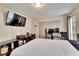 Bright bedroom with a large bed and workspace at 8647 Fancy Finch Dr # 203, Tampa, FL 33614