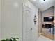 Condo entry with view of living room and fireplace at 8647 Fancy Finch Dr # 203, Tampa, FL 33614
