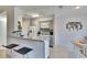 Bright kitchen features a breakfast bar and updated appliances at 8647 Fancy Finch Dr # 203, Tampa, FL 33614