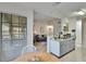 Eat-in kitchen with breakfast bar and modern gray cabinets at 8647 Fancy Finch Dr # 203, Tampa, FL 33614