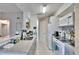 Updated kitchen with gray cabinets, stainless steel appliances and breakfast bar at 8647 Fancy Finch Dr # 203, Tampa, FL 33614