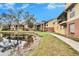 Condos with scenic pond views and well-maintained landscaping at 8647 Fancy Finch Dr # 203, Tampa, FL 33614