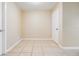 Empty spare bedroom with tile floors and closet at 9119 Tudor Dr # E201, Tampa, FL 33615