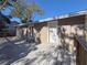 Large deck with white doors and a view of the backyard at 1116 E Boyer St, Tarpon Springs, FL 34689