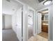 Clean hallway with doors to bedrooms and bathroom at 1116 E Boyer St, Tarpon Springs, FL 34689