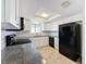 Updated kitchen with white cabinets and granite countertops at 1116 E Boyer St, Tarpon Springs, FL 34689