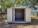 Empty storage shed with double doors at 1116 E Boyer St, Tarpon Springs, FL 34689