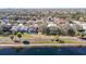 Aerial view of homes near lake with pool at 11616 Crest Creek Dr, Riverview, FL 33569