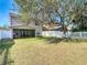 Backyard with covered patio and fenced-in area at 11616 Crest Creek Dr, Riverview, FL 33569