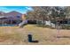 Houses with fenced backyards and a shared green space at 11616 Crest Creek Dr, Riverview, FL 33569