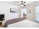 Spacious bedroom with a double bed and access to a hallway at 11616 Crest Creek Dr, Riverview, FL 33569