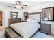 Bright bedroom with plush bedding and built-in shelving at 11616 Crest Creek Dr, Riverview, FL 33569