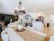 Bright dining area with a farmhouse table and chandelier at 11616 Crest Creek Dr, Riverview, FL 33569