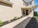 Inviting front entry with walkway, landscaping, and dark brown door at 11616 Crest Creek Dr, Riverview, FL 33569