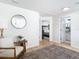 Bright hallway with access to bedroom and bathroom at 11616 Crest Creek Dr, Riverview, FL 33569