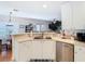 Modern kitchen with stainless steel appliances and an island at 11616 Crest Creek Dr, Riverview, FL 33569