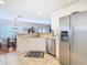 Modern kitchen with stainless steel appliances and white cabinets at 11616 Crest Creek Dr, Riverview, FL 33569