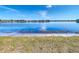 Stunning view of a serene lake reflecting the sky at 11616 Crest Creek Dr, Riverview, FL 33569