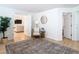 Cozy living area with a comfy chair and access to other rooms at 11616 Crest Creek Dr, Riverview, FL 33569
