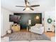 Spacious living area features a corner TV, comfy seating, and a large area rug at 11616 Crest Creek Dr, Riverview, FL 33569