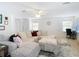 Open living area with sectional sofa, workstation, and natural light at 11616 Crest Creek Dr, Riverview, FL 33569