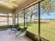 Spacious screened patio overlooking a beautiful backyard at 11616 Crest Creek Dr, Riverview, FL 33569
