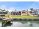 A home with a private dock, pool, and canal view at 127 6Th E St, Tierra Verde, FL 33715