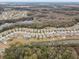 Aerial view of a house in a quiet residential neighborhood at 13456 Marble Sands Ct, Hudson, FL 34669