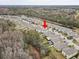 Aerial view showcasing home's location near a canal at 13456 Marble Sands Ct, Hudson, FL 34669