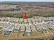 Aerial view of a house in a quiet residential neighborhood at 13456 Marble Sands Ct, Hudson, FL 34669