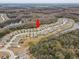 Aerial view showing home's location within a residential community at 13456 Marble Sands Ct, Hudson, FL 34669