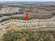 Aerial view of a house in a quiet residential neighborhood at 13456 Marble Sands Ct, Hudson, FL 34669