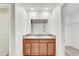 Double vanity bathroom with granite countertops at 13456 Marble Sands Ct, Hudson, FL 34669