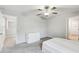 Bright bedroom with ceiling fan and access to loft at 13456 Marble Sands Ct, Hudson, FL 34669