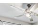 Modern ceiling fan with light kit at 13456 Marble Sands Ct, Hudson, FL 34669